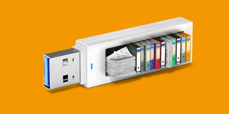 Une clé USB remplie de livres, de fichiers et de dossiers